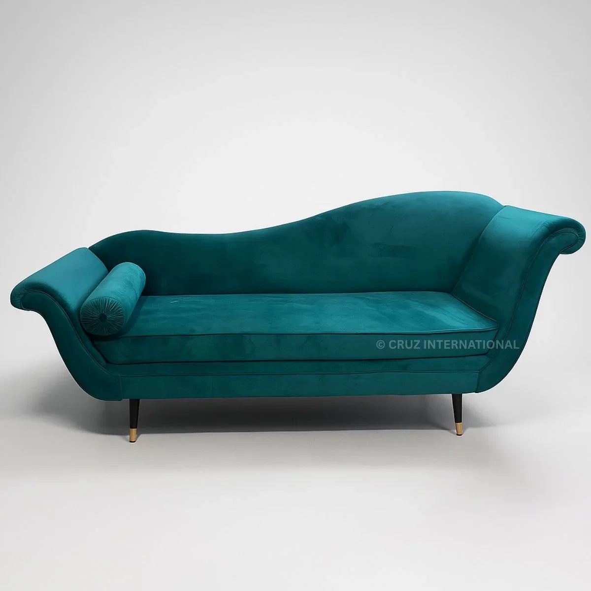 Teal sofa on a white background with 'Cruz International' branding.